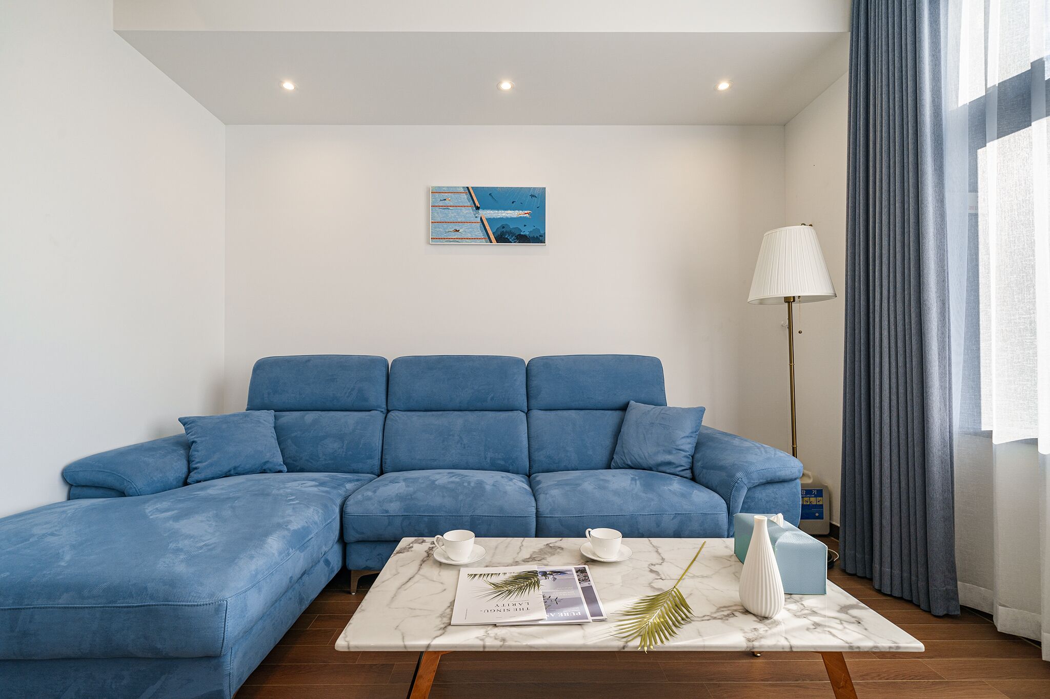 premium studio suite | living area | 55-inch smart tv with digital channels, tv, heated floors