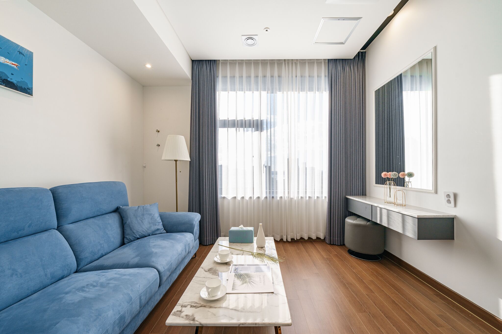 premium studio suite | living area | 55-inch smart tv with digital channels, tv, heated floors