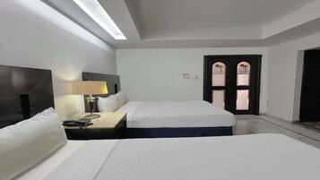 Deluxe Studio, 2 Queen Beds, Non Smoking | Premium bedding, rollaway beds, free WiFi, bed sheets