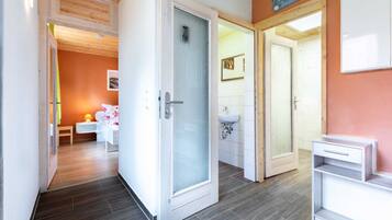 2 bedrooms, travel crib, WiFi, bed sheets