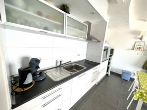 Fridge, oven, coffee/tea maker, toaster