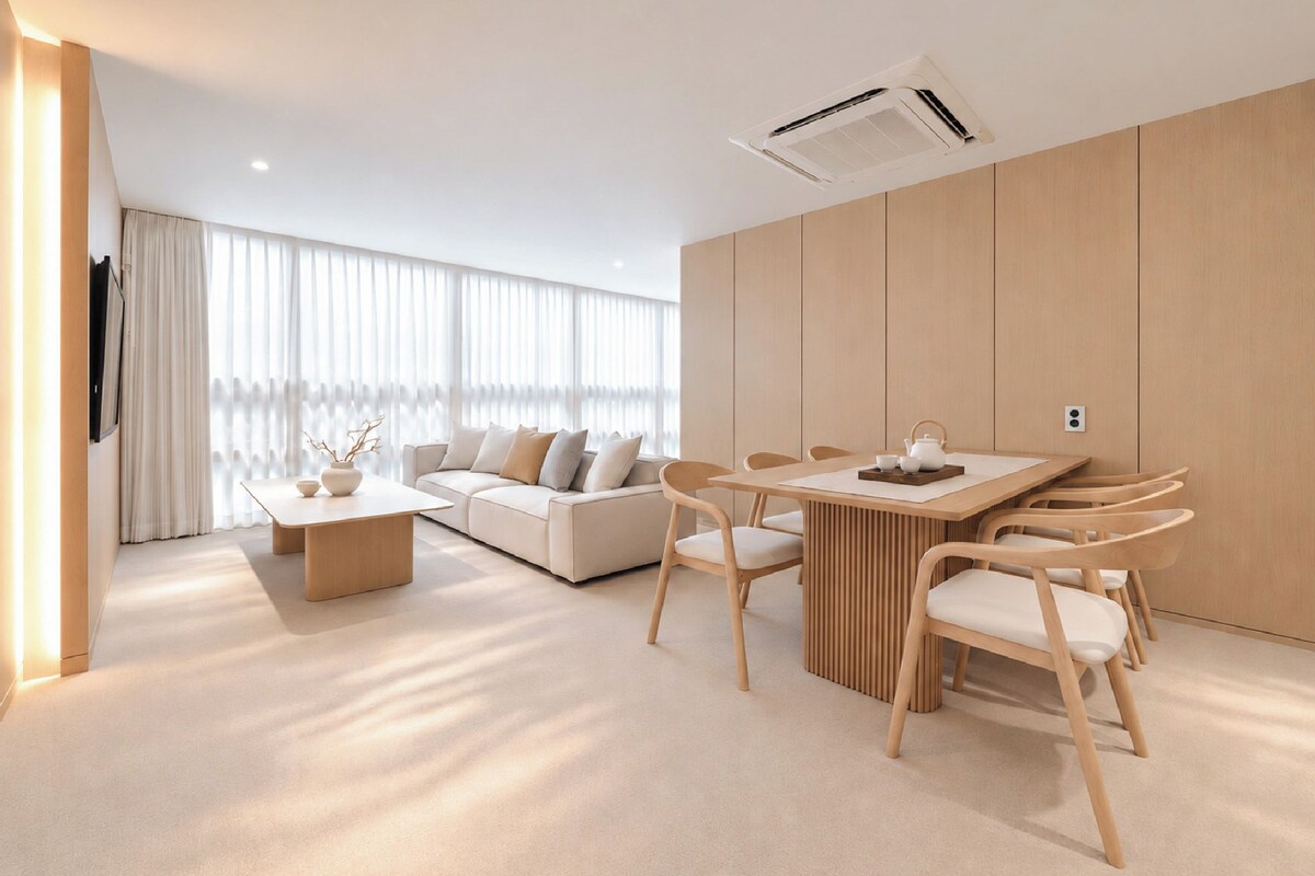 Annex Superior Family Suite | Living area | 55-inch TV with cable channels