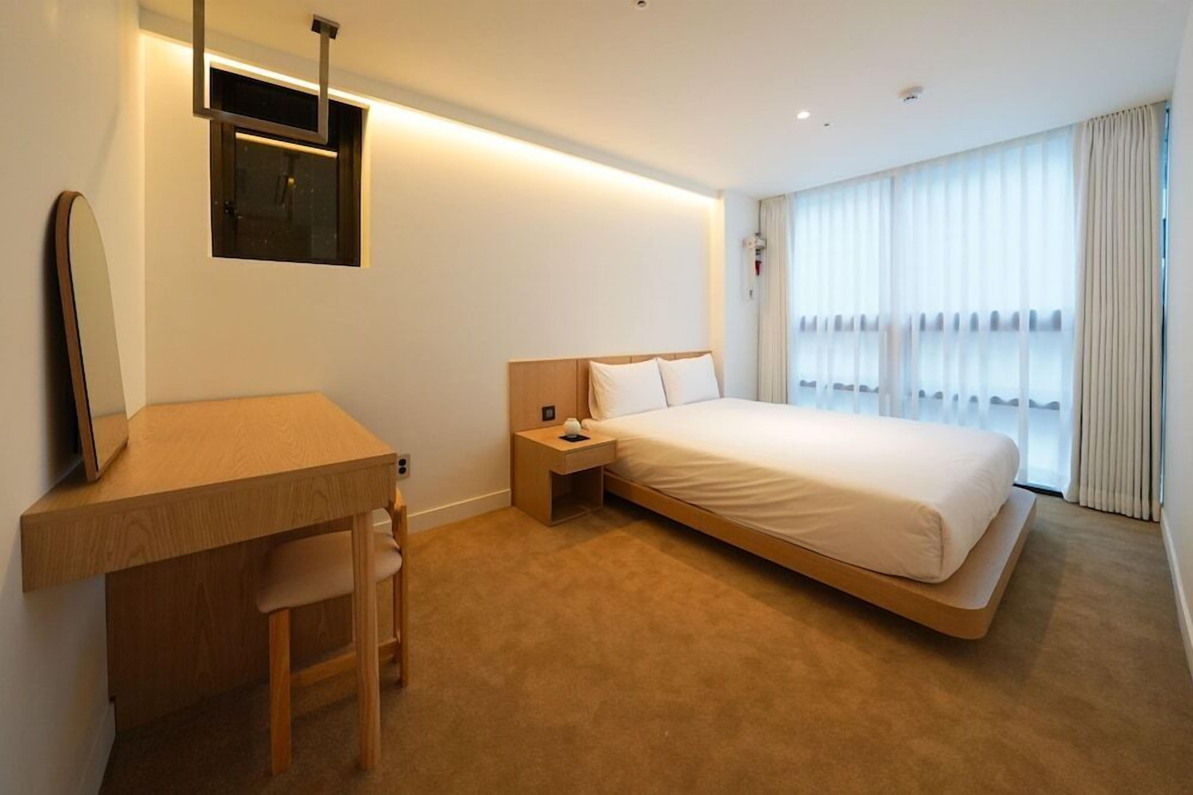 Blackout drapes, iron/ironing board, free WiFi, bed sheets