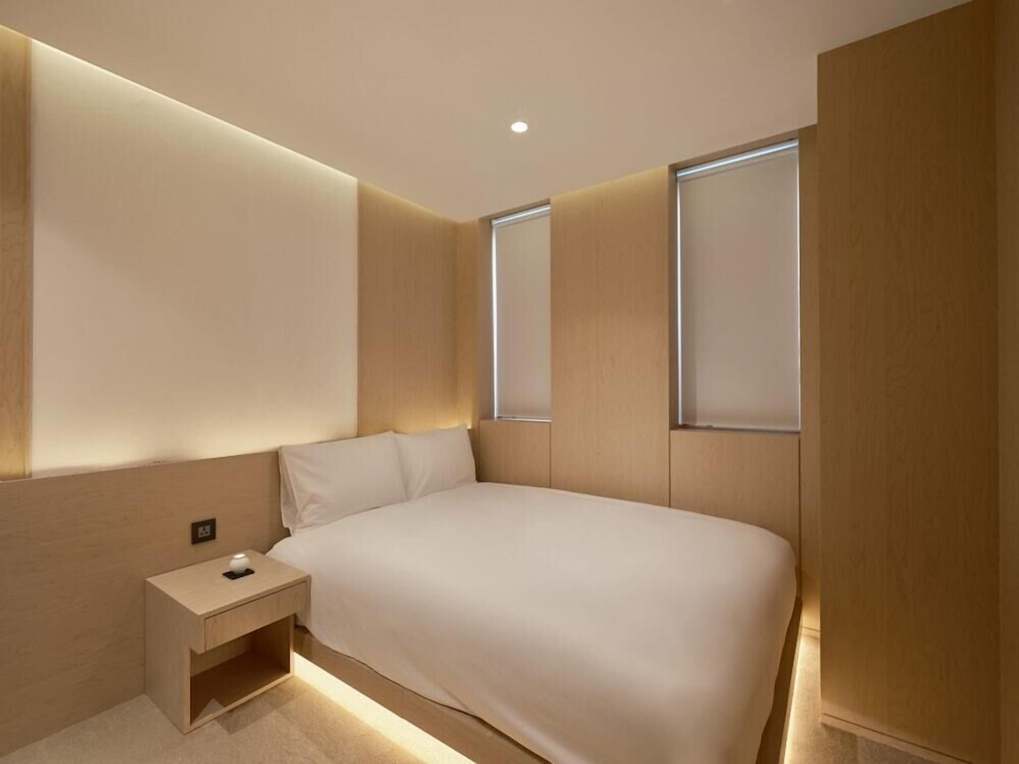 Blackout drapes, iron/ironing board, free WiFi, bed sheets