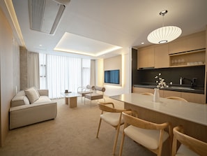 Main Grand Suite - Private Floor | Living area | 55-inch TV with cable channels - UH Suite The Myeongdong (Seoul)