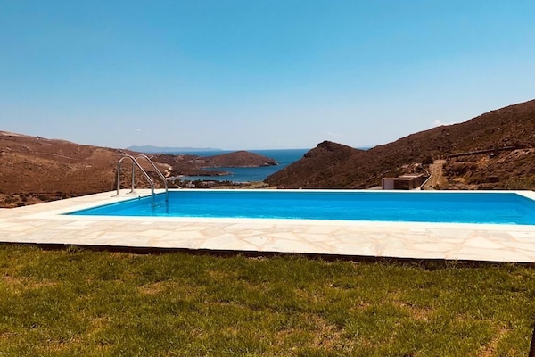 Where the pool ends and the Aegean begins.