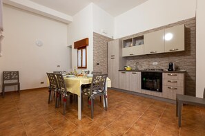 Apartment | Private kitchen | Fridge, espresso maker