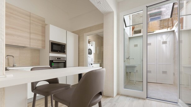 A modern kitchen with a white countertop, stainless steel appliances, and a glass door leading to a bathroom. - 2252 Suite 79 by Barbarhouse (Lecce)