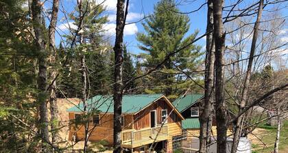 Saranac Lake Adirondack Modern Loft-fire pit, river access, 100 acre forest