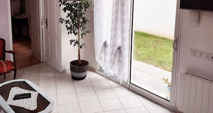 Detached single-storey house 50 m2 with small enclosed garden.