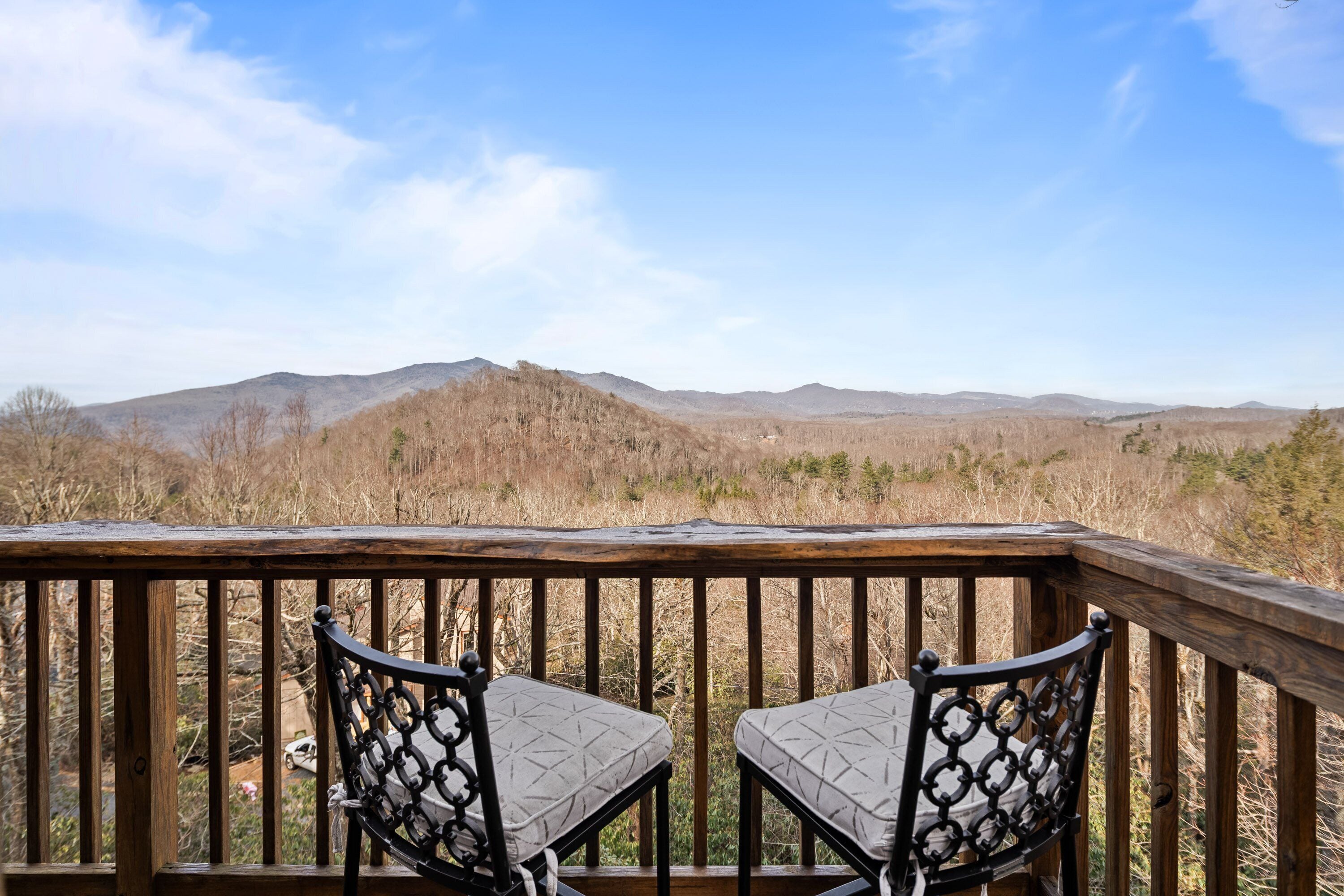 Sip your morning coffee or evening wine at the live-edge bar while taking in sweeping long-range Blue Ridge views.