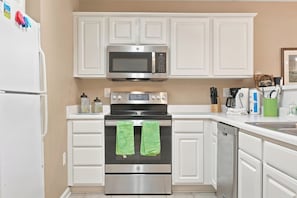 Coffee/tea maker, fridge, microwave, oven