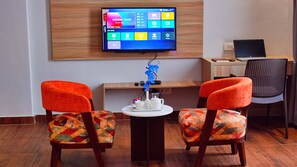 In-room safe, desk, laptop workspace, blackout curtains - Sshubh Hotel Nathdwara (Nathdwara)