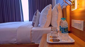 In-room safe, desk, laptop workspace, blackout curtains - Sshubh Hotel Nathdwara (Nathdwara)