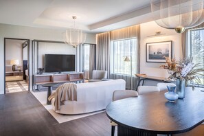 Presidential Suite, 1 King Bed | Living area | 55-inch flat-screen TV with cable channels, TV