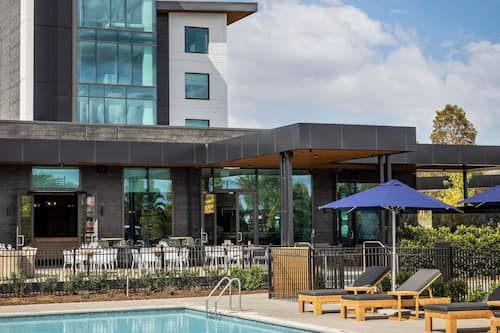 Outdoor pool, open 7:00 AM to 6:00 PM, pool umbrellas, pool loungers