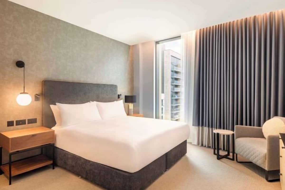 Egyptian cotton sheets, premium bedding, down comforters, in-room safe