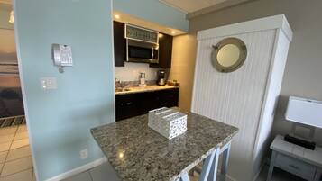 Fridge, microwave, coffee/tea maker, toaster