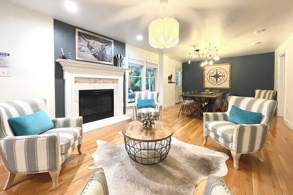 Smart TV, fireplace, table football, books