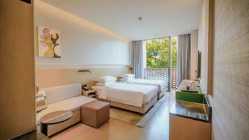 Premium bedding, memory-foam beds, in-room safe, blackout curtains