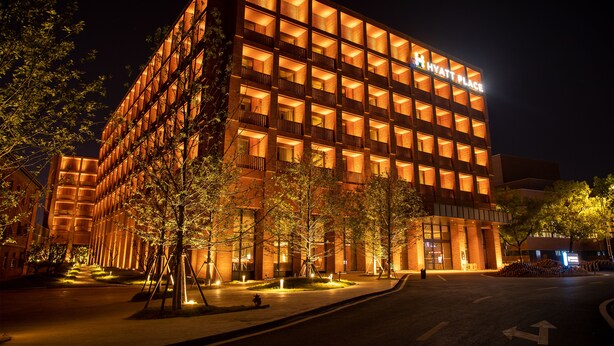 A modern hotel with a grid of balconies and a prominent sign reading "Hyatt Place". - Hyatt Place Jingdezhen Taoxichuan (Jingdezhen)