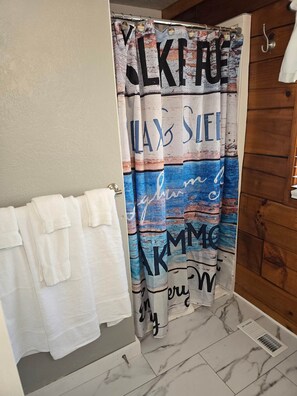 Shower, hair dryer, towels