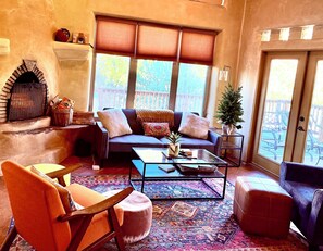 Smart TV, fireplace, books, printers