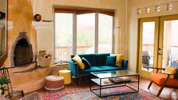Smart TV, fireplace, books, printers