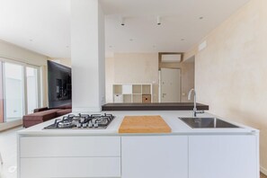 Fridge, microwave, oven, stovetop - Luxurious and modern penthouse facing the sea with private solarium on the seafront of Lido di Camaiore with private parking space. The flat is on two levels.The flat opens with the bright living room, where there is a comfortable double sofa bed, dining (Lido di Camaiore)