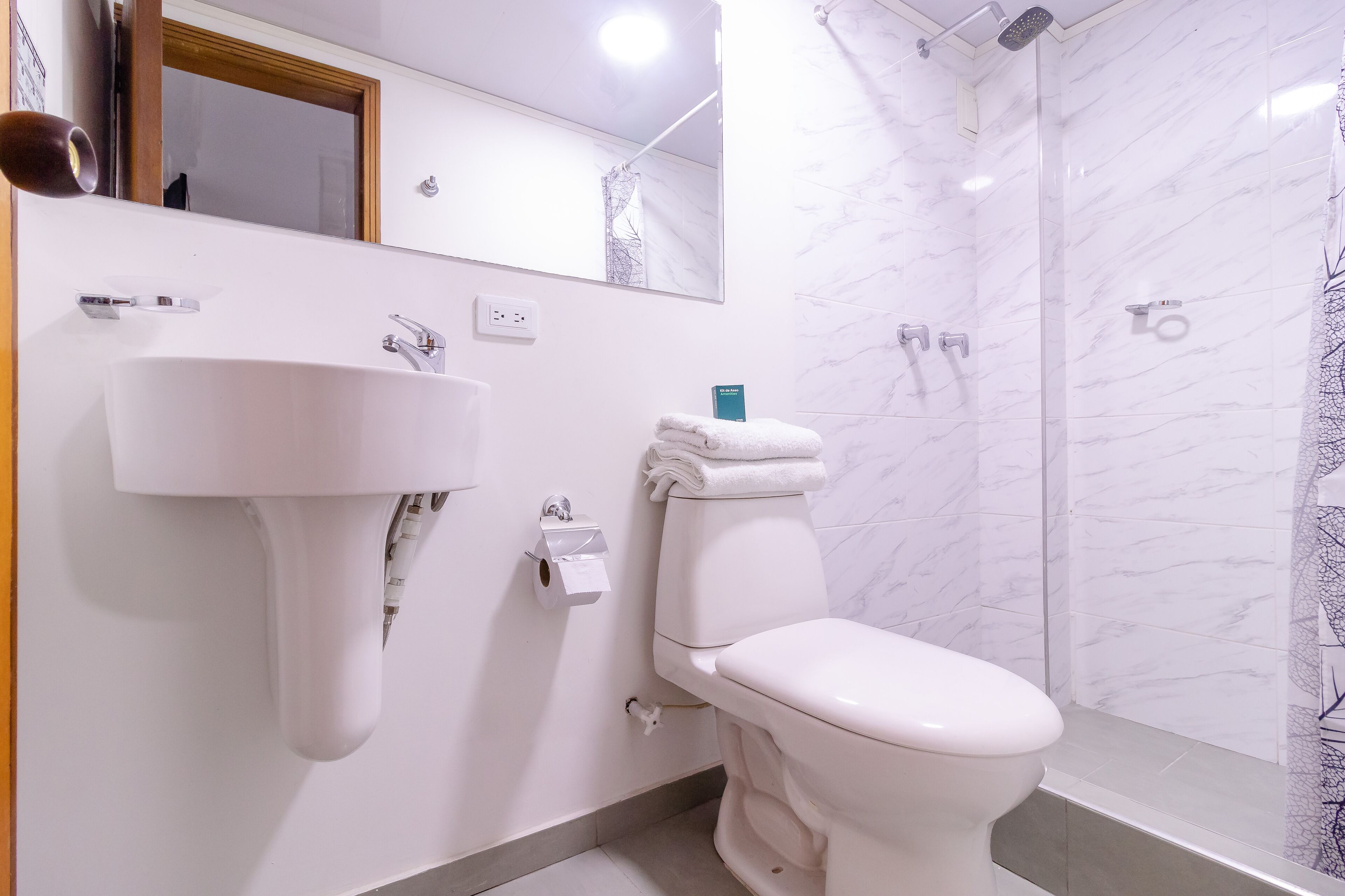 shower, designer toiletries, towels, soap