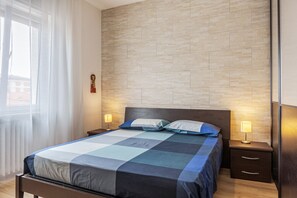 2 habitaciones, tabla de planchar con plancha y wifi gratis 