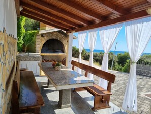 Outdoor dining - Apt with terrace, just 3 min walk to the beach (Rogoznica)