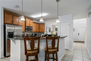 Fridge, microwave, oven, stovetop - Bella Villa with Pool Theater  (Kissimmee)