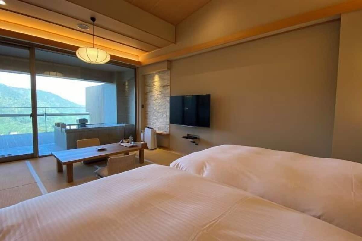 1 chambre, literie de qualité, couette en duvet, coffre-fort