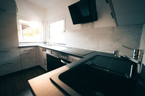 Fridge, dishwasher, coffee/tea maker, toaster