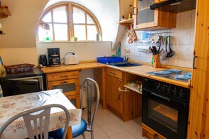 Fridge, microwave, oven, dishwasher - Vacation apartment 1 - Holiday apartment Haus Lübeck (Penzlin)