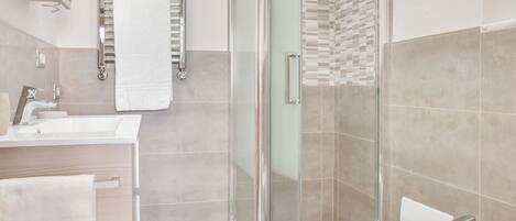 Shower, hair dryer, bidet, toilet paper