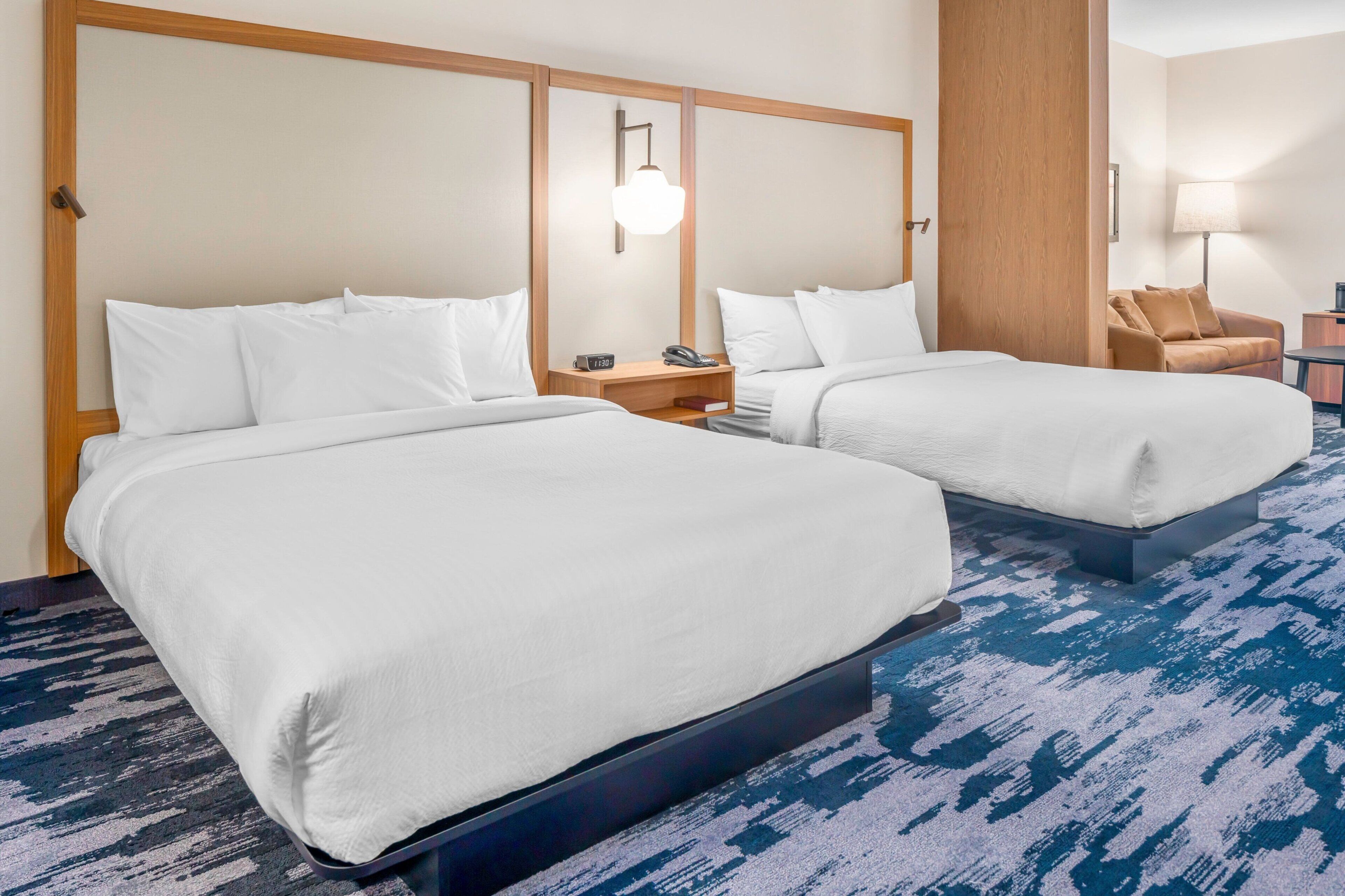 Pillowtop beds, desk, iron/ironing board, free cribs/infant beds