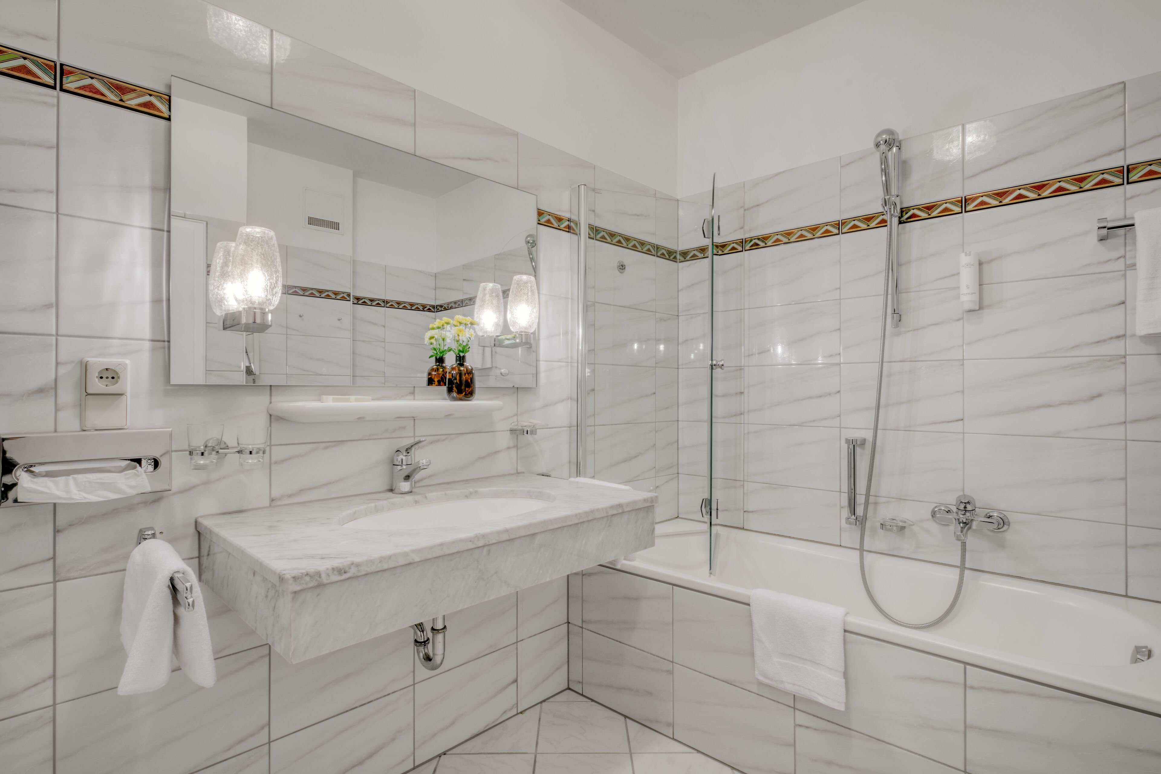 free toiletries, hair dryer, slippers, towels