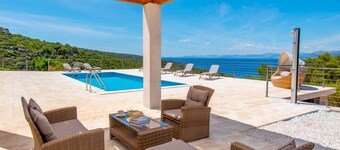 Luxury Villa Castello di Pietra with private heated pool, private parking, gym, children are welcomed in Pučišća, Brač.