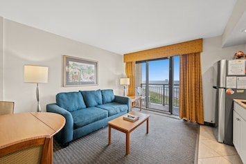 The ocean front living room is well-appointed with comfortable furnishings.