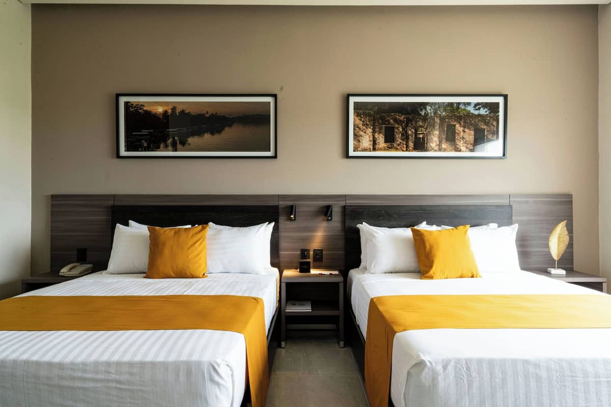 Standard Room, 2 Queen Beds (partial view) | Minibar, in-room safe, individually decorated, desk