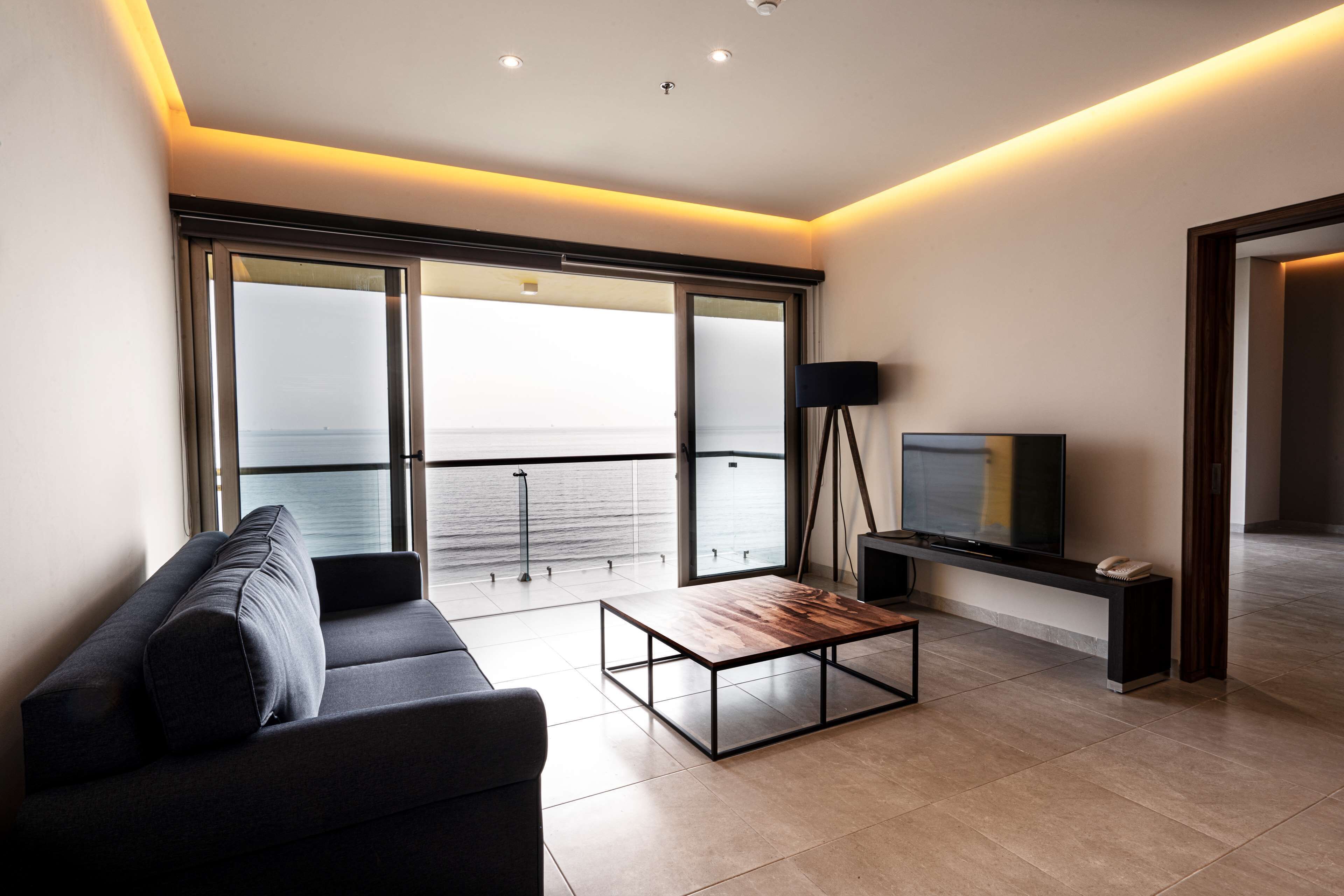 suite, 1 king bed, non smoking, ocean view (living room;with sofabed) | room amenity