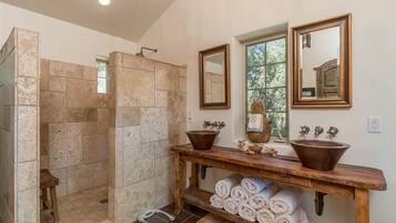 Bathtub, hair dryer, towels, soap