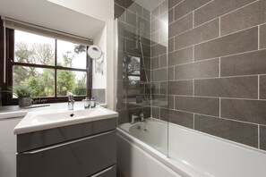 Combined shower/tub, hair dryer