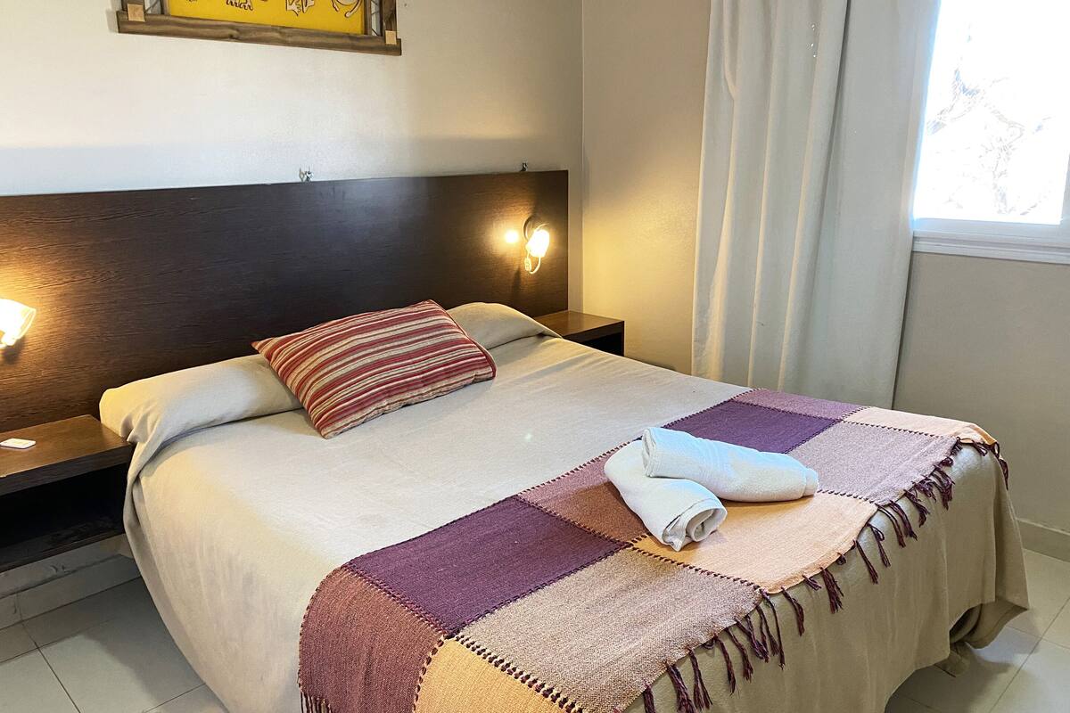 Premium bedding, down comforters, pillowtop beds, desk