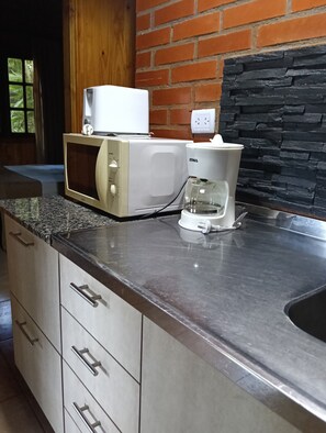 Standard Cabin | Private kitchen | Full-size fridge, microwave, oven, stovetop