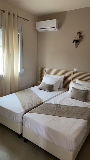 2 quartos, ferros/tábuas de passar roupa, berço de viagem, Wi-Fi