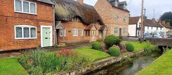 Village Period Cottage next to a idyllic stream