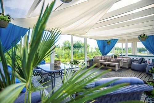 Air-conditioned holiday homes, summer pool, sauna